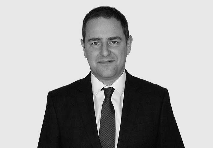 A headshot image of Greg Owens
